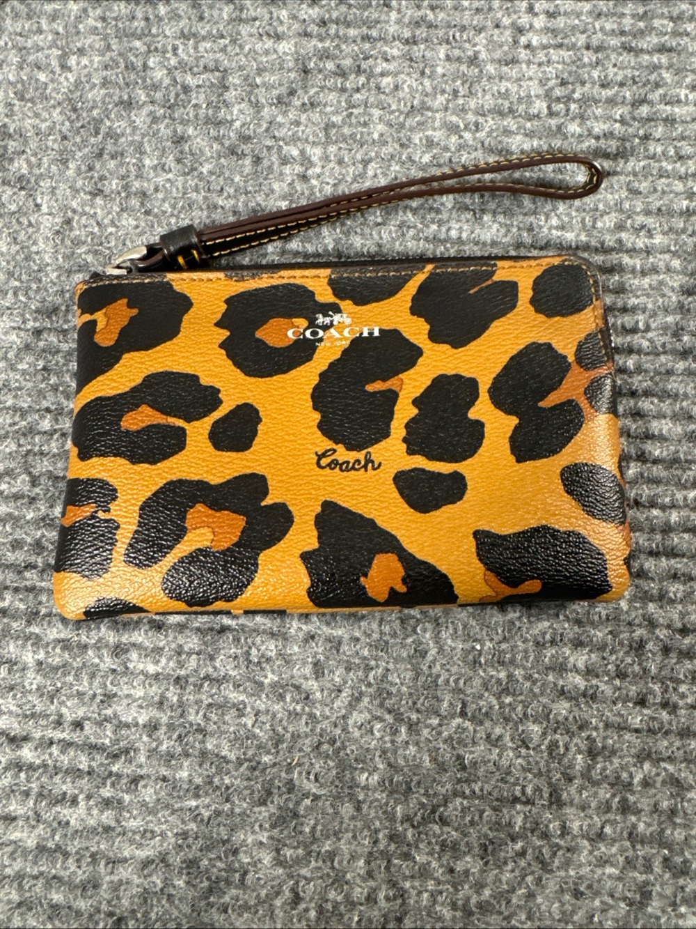 Coach Corner Zip Wristlet Leopard Print Brown, 4” x 6”